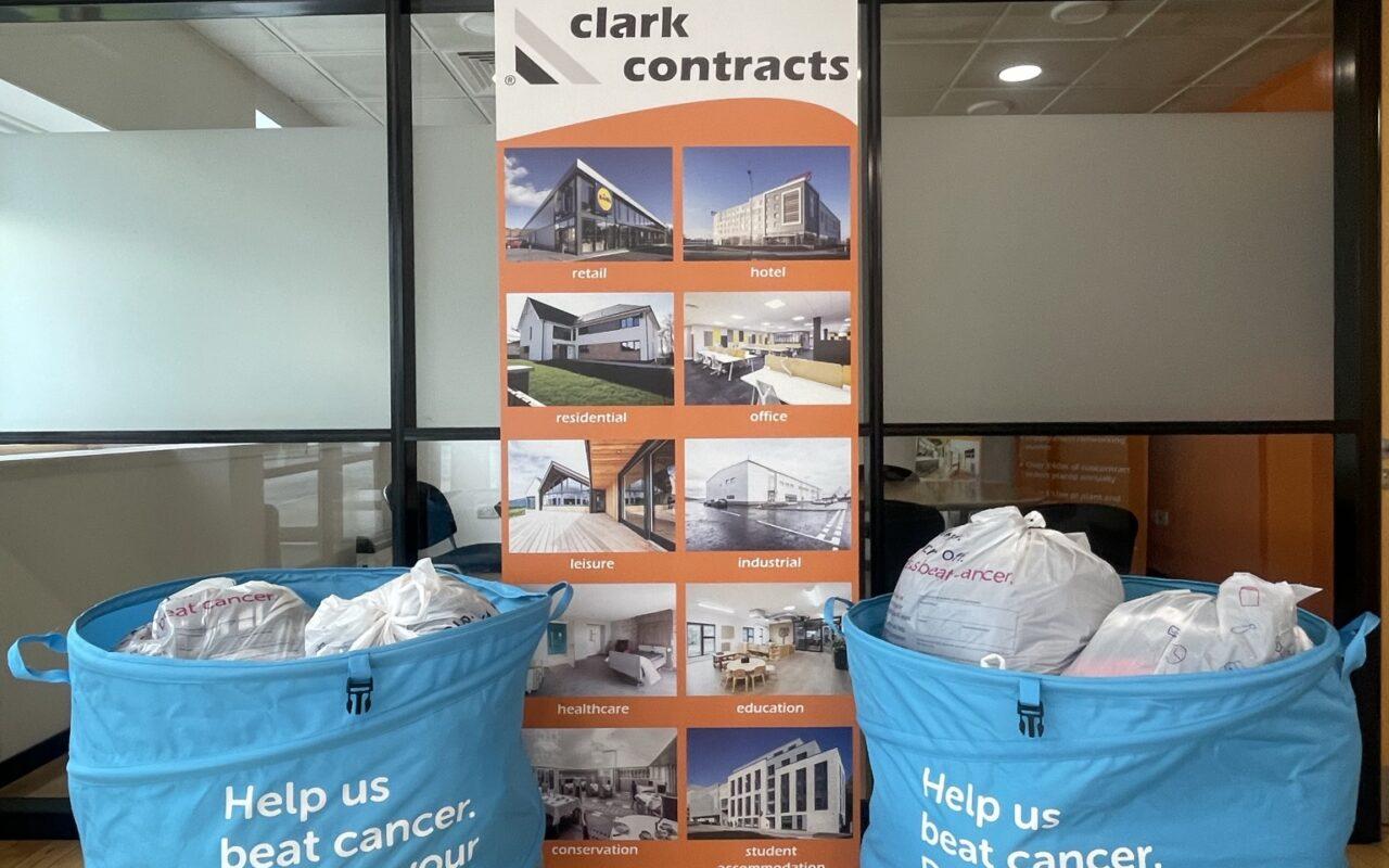 Clark Contracts donates 25 bags of clothing to Cancer Research UK